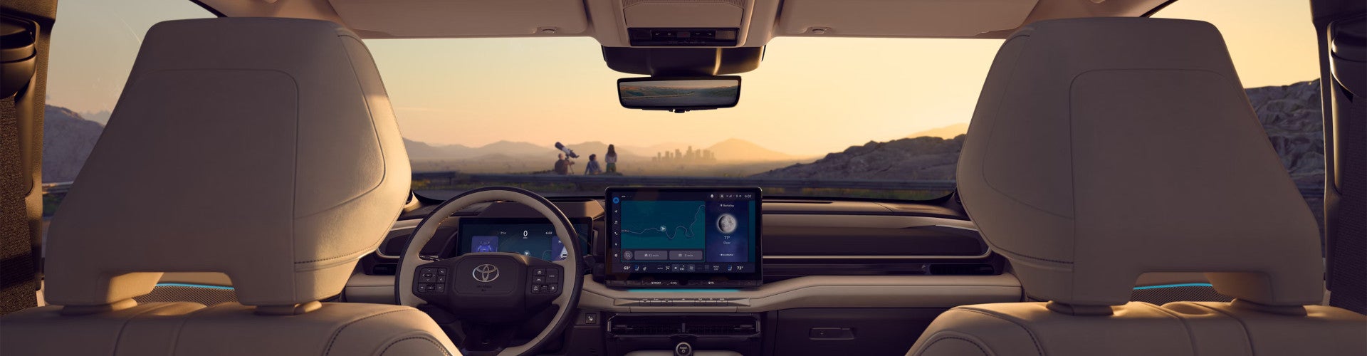 2027 Toyota Highlander family looking outside the city streets