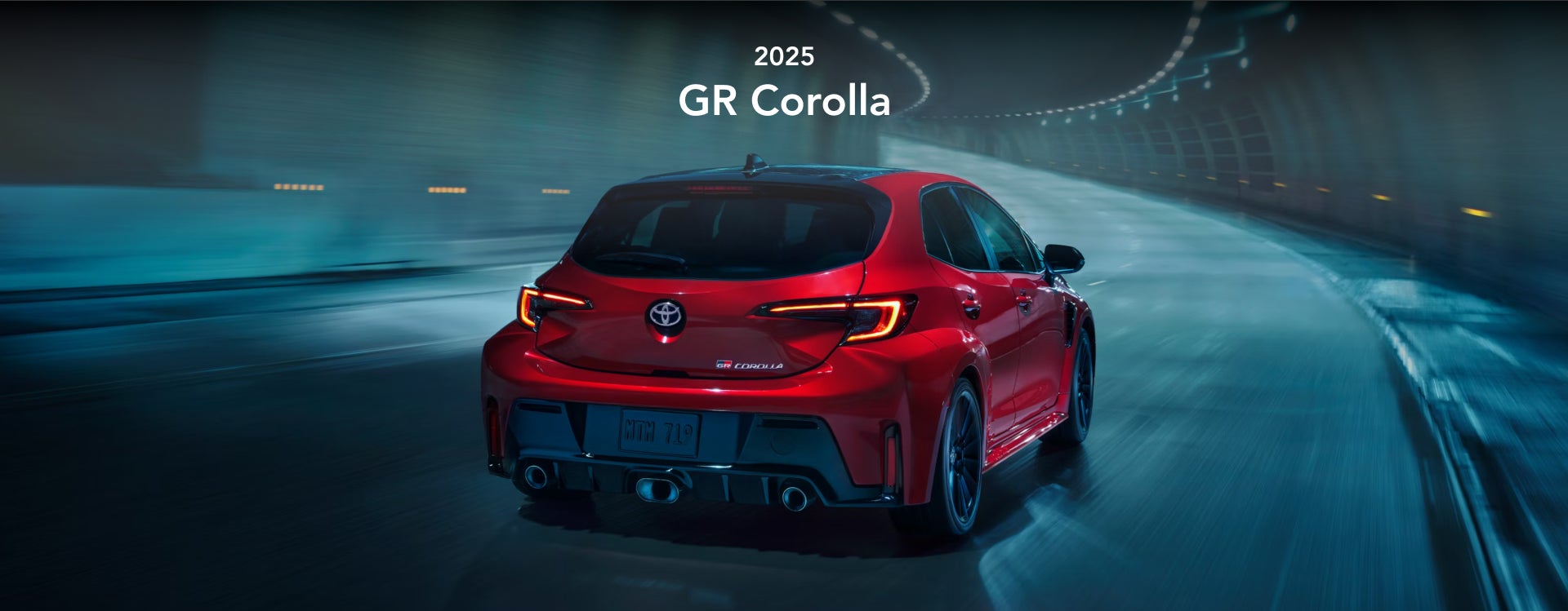 Red 2025 GR Corolla speeding thru tunnel