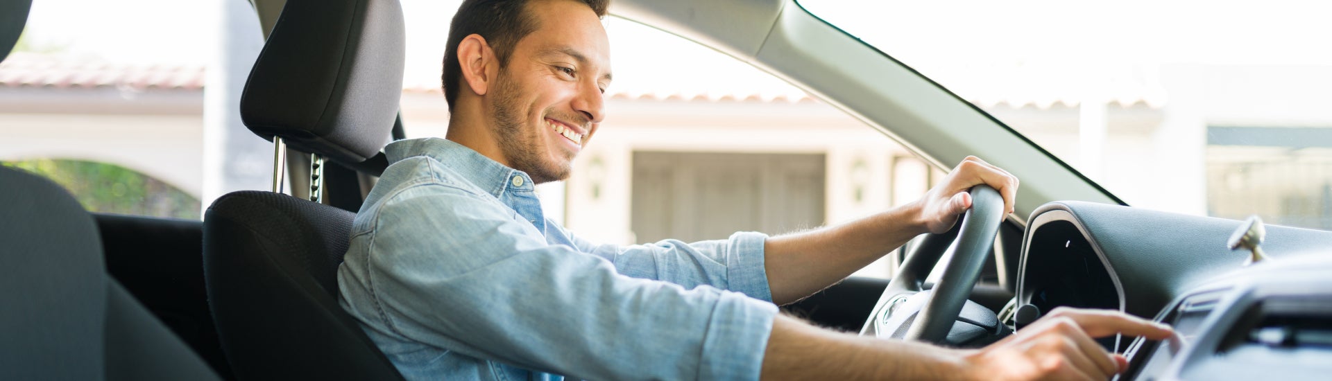 First Time Buyer driving off in her new vehicle