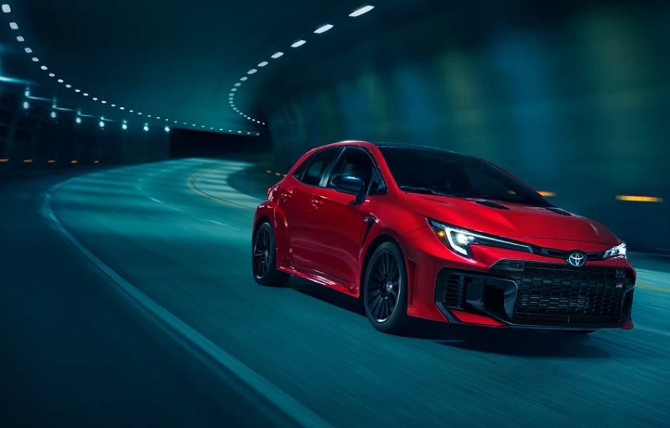 Red 2025 GR Corolla racing on track