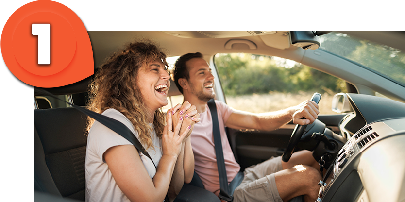 A couple driving away worry free